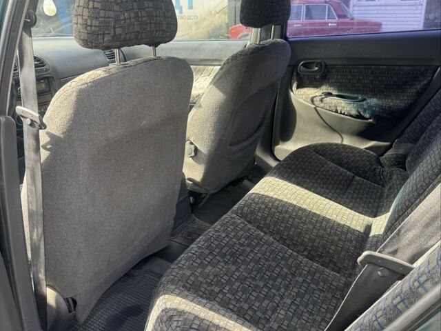 Зелений Деу Нубіра, об'ємом двигуна 2 л та пробігом 209 тис. км за 1600 $, фото 5 на Automoto.ua