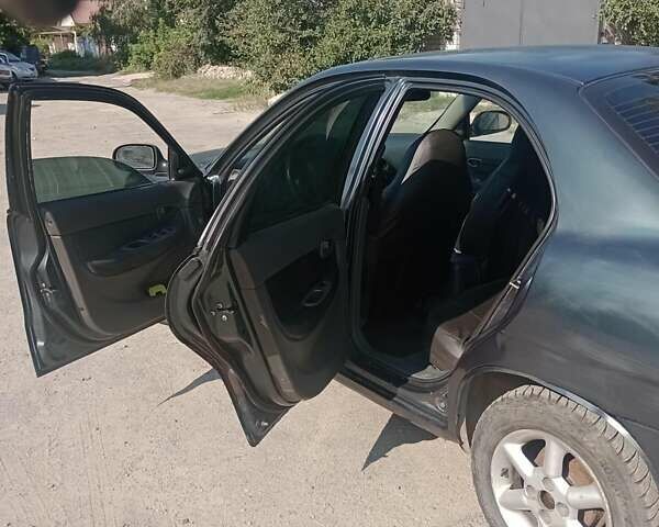 Зеленый Дэу Нубира, объемом двигателя 1.6 л и пробегом 200 тыс. км за 1500 $, фото 7 на Automoto.ua