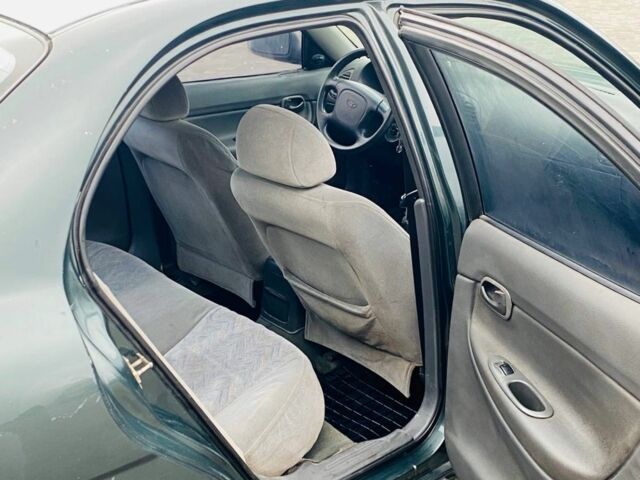 Зелений Деу Нубіра, об'ємом двигуна 1.6 л та пробігом 250 тис. км за 1100 $, фото 10 на Automoto.ua