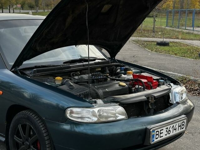 Зеленый Дэу Нубира, объемом двигателя 1.6 л и пробегом 255 тыс. км за 1599 $, фото 8 на Automoto.ua