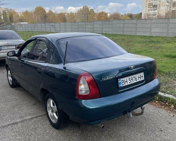 Зеленый Дэу Нубира, объемом двигателя 1.6 л и пробегом 214 тыс. км за 1600 $, фото 5 на Automoto.ua