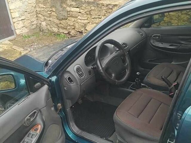 Зеленый Дэу Нубира, объемом двигателя 1.6 л и пробегом 340 тыс. км за 1500 $, фото 13 на Automoto.ua