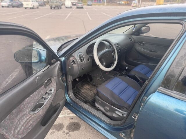 Зеленый Дэу Нубира, объемом двигателя 1.6 л и пробегом 290 тыс. км за 1350 $, фото 6 на Automoto.ua