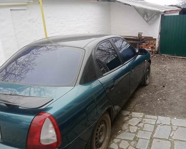 Зелений Деу Нубіра, об'ємом двигуна 1.6 л та пробігом 200 тис. км за 2300 $, фото 4 на Automoto.ua