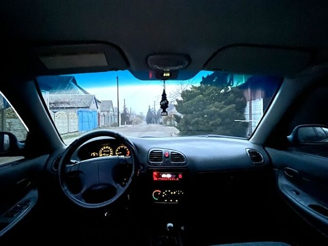 Зеленый Дэу Нубира, объемом двигателя 1.6 л и пробегом 246 тыс. км за 1800 $, фото 6 на Automoto.ua