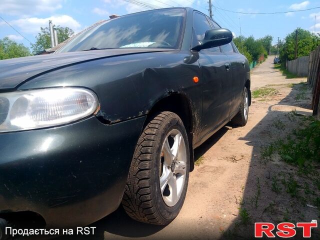 Зелений Деу Нубіра, об'ємом двигуна 1.6 л та пробігом 300 тис. км за 1150 $, фото 4 на Automoto.ua