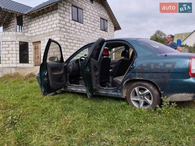 Зеленый Дэу Нубира, объемом двигателя 1.6 л и пробегом 205 тыс. км за 1650 $, фото 4 на Automoto.ua