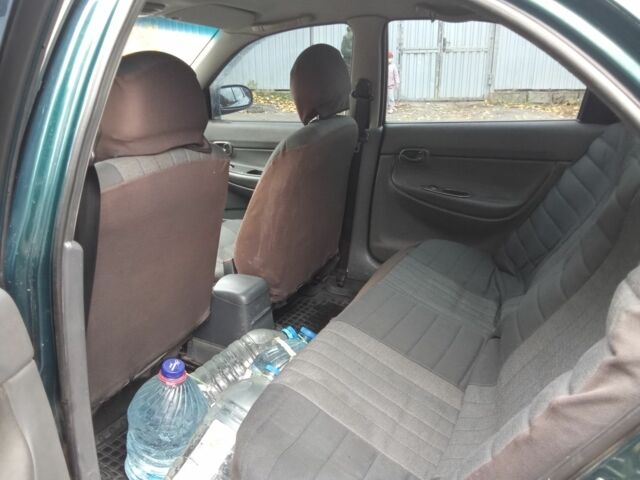 Зелений Деу Нубіра, об'ємом двигуна 2 л та пробігом 240 тис. км за 1313 $, фото 5 на Automoto.ua