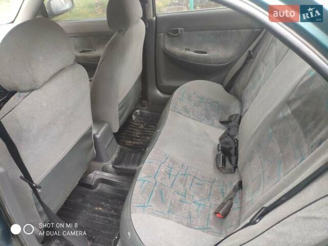 Зеленый Дэу Нубира, объемом двигателя 1.6 л и пробегом 256 тыс. км за 750 $, фото 11 на Automoto.ua