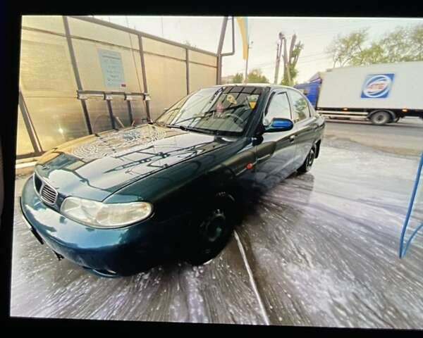 Зеленый Дэу Нубира, объемом двигателя 1.6 л и пробегом 280 тыс. км за 1950 $, фото 2 на Automoto.ua