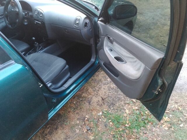 Зеленый Дэу Нубира, объемом двигателя 1.6 л и пробегом 204 тыс. км за 2700 $, фото 2 на Automoto.ua