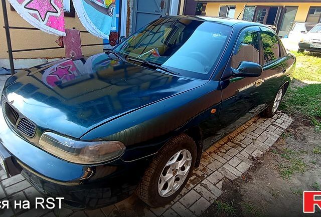 Зеленый Дэу Нубира, объемом двигателя 1.6 л и пробегом 435 тыс. км за 1600 $, фото 1 на Automoto.ua