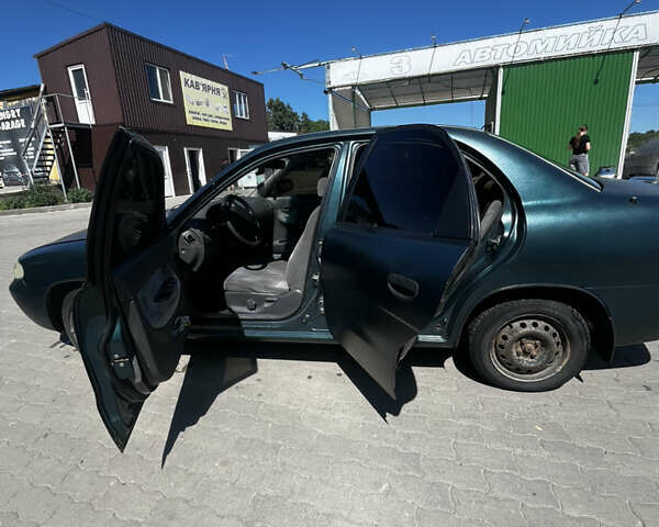 Зелений Деу Нубіра, об'ємом двигуна 1.6 л та пробігом 892 тис. км за 1700 $, фото 7 на Automoto.ua