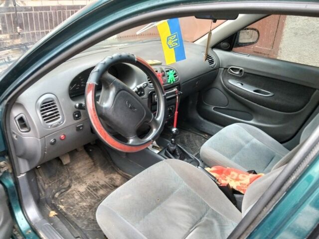 Зеленый Дэу Нубира, объемом двигателя 1.6 л и пробегом 300 тыс. км за 1662 $, фото 4 на Automoto.ua