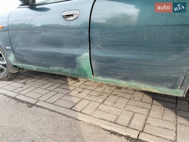 Деу Нубіра 1998 у Кременчуге на Automoto.ua Зелений Деу Нубіра, об'ємом двигуна 1.6 л та пробігом 345 тис. км за 1200 $, фото 10 на Automoto.ua