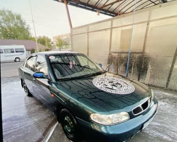 Зеленый Дэу Нубира, объемом двигателя 1.6 л и пробегом 280 тыс. км за 1950 $, фото 4 на Automoto.ua