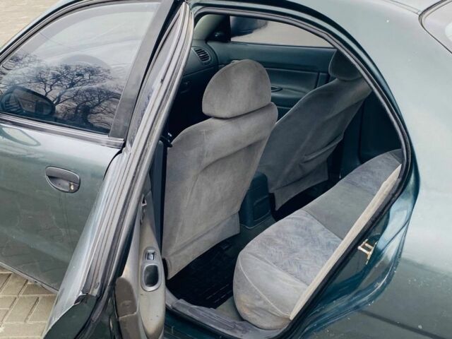 Зелений Деу Нубіра, об'ємом двигуна 1.6 л та пробігом 250 тис. км за 1100 $, фото 13 на Automoto.ua