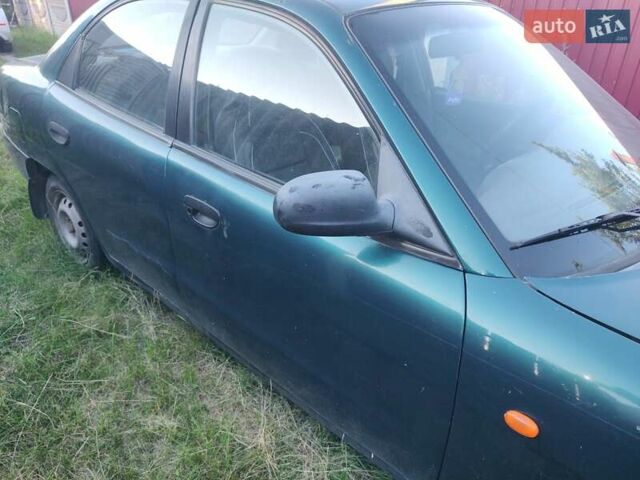 Зелений Деу Нубіра, об'ємом двигуна 1.6 л та пробігом 945 тис. км за 1200 $, фото 3 на Automoto.ua