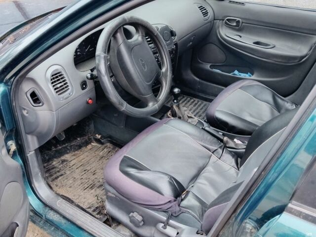 Зеленый Дэу Нубира, объемом двигателя 1.6 л и пробегом 363 тыс. км за 500 $, фото 3 на Automoto.ua