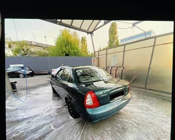 Зеленый Дэу Нубира, объемом двигателя 1.6 л и пробегом 280 тыс. км за 1950 $, фото 8 на Automoto.ua