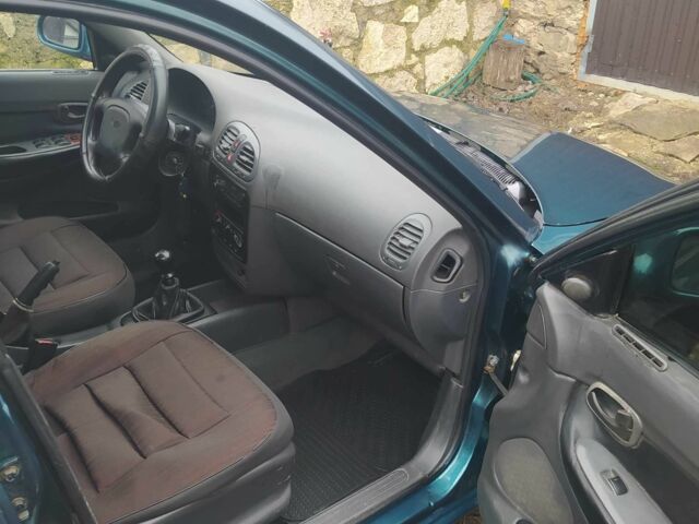 Зеленый Дэу Нубира, объемом двигателя 1.6 л и пробегом 340 тыс. км за 1500 $, фото 9 на Automoto.ua