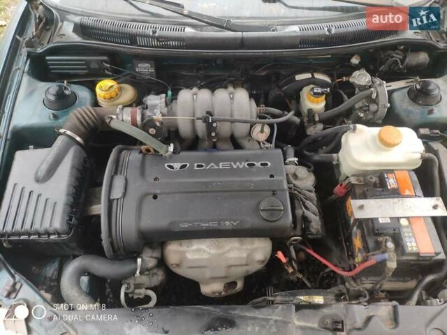 Зеленый Дэу Нубира, объемом двигателя 1.6 л и пробегом 256 тыс. км за 750 $, фото 8 на Automoto.ua