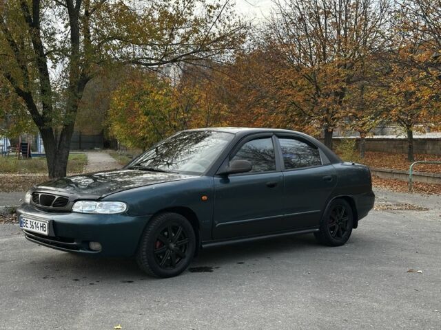 Зеленый Дэу Нубира, объемом двигателя 1.6 л и пробегом 255 тыс. км за 1599 $, фото 2 на Automoto.ua