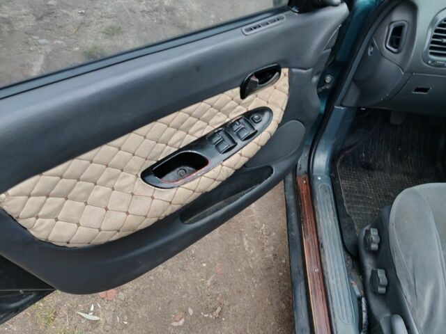 Зелений Деу Нубіра, об'ємом двигуна 1.6 л та пробігом 300 тис. км за 592 $, фото 2 на Automoto.ua