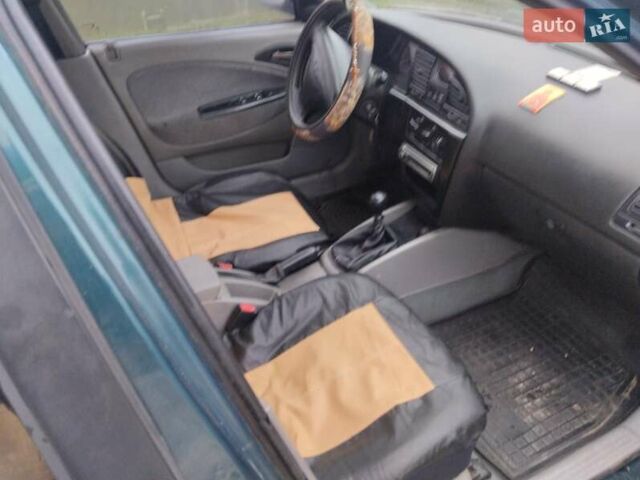 Зеленый Дэу Нубира, объемом двигателя 2 л и пробегом 230 тыс. км за 2700 $, фото 4 на Automoto.ua