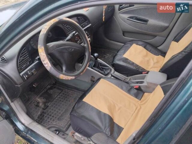 Зеленый Дэу Нубира, объемом двигателя 2 л и пробегом 230 тыс. км за 2700 $, фото 3 на Automoto.ua