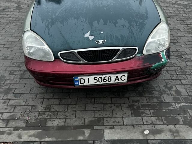 Зеленый Дэу Нубира, объемом двигателя 2 л и пробегом 317 тыс. км за 1800 $, фото 7 на Automoto.ua