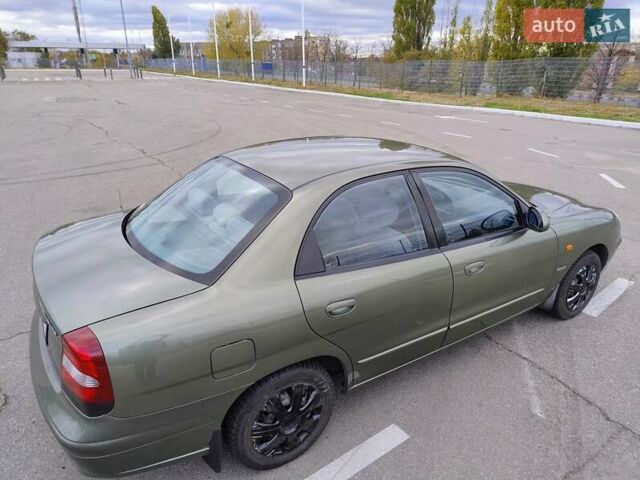 Зеленый Дэу Нубира, объемом двигателя 2 л и пробегом 363 тыс. км за 2900 $, фото 3 на Automoto.ua