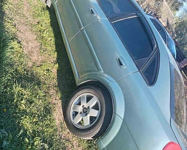 Зеленый Дэу Нубира, объемом двигателя 1.6 л и пробегом 250 тыс. км за 3200 $, фото 4 на Automoto.ua