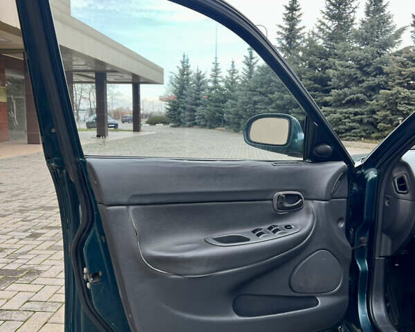 Зелений Деу Нубіра, об'ємом двигуна 2 л та пробігом 240 тис. км за 2500 $, фото 33 на Automoto.ua