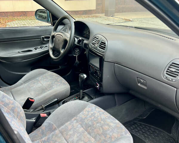 Зеленый Дэу Нубира, объемом двигателя 2 л и пробегом 240 тыс. км за 2500 $, фото 38 на Automoto.ua