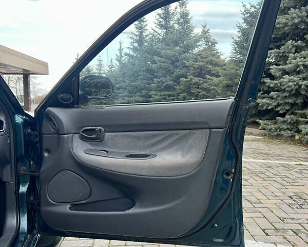 Зеленый Дэу Нубира, объемом двигателя 2 л и пробегом 240 тыс. км за 2200 $, фото 34 на Automoto.ua