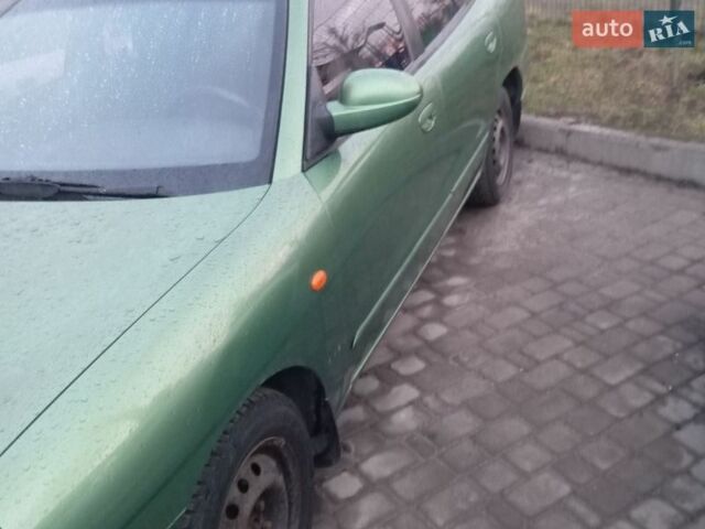 Зеленый Дэу Нубира, объемом двигателя 2 л и пробегом 300 тыс. км за 2000 $, фото 4 на Automoto.ua