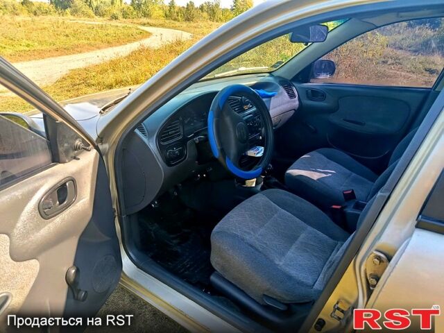 Бежевый Дэу Сенс, объемом двигателя 1.3 л и пробегом 350 тыс. км за 1900 $, фото 8 на Automoto.ua