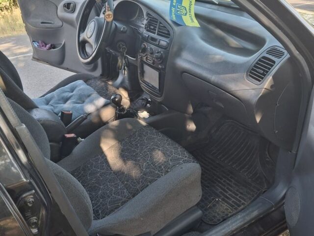 Черный Дэу Сенс, объемом двигателя 1.5 л и пробегом 335 тыс. км за 2700 $, фото 1 на Automoto.ua