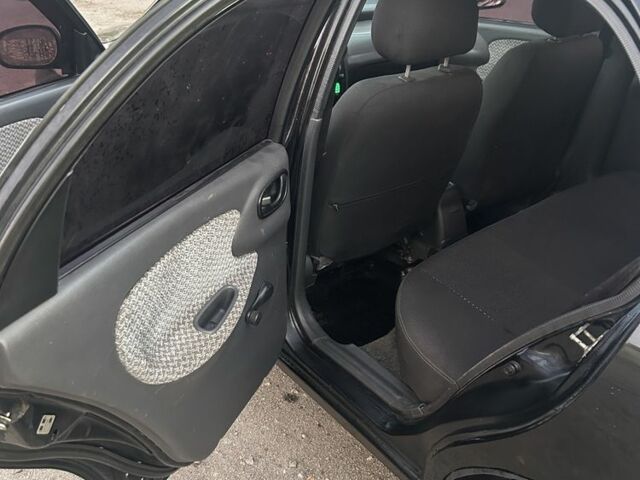 Черный Дэу Сенс, объемом двигателя 1.4 л и пробегом 310 тыс. км за 2300 $, фото 8 на Automoto.ua