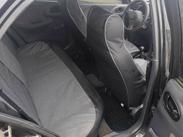 Черный Дэу Сенс, объемом двигателя 1.5 л и пробегом 251 тыс. км за 3700 $, фото 6 на Automoto.ua