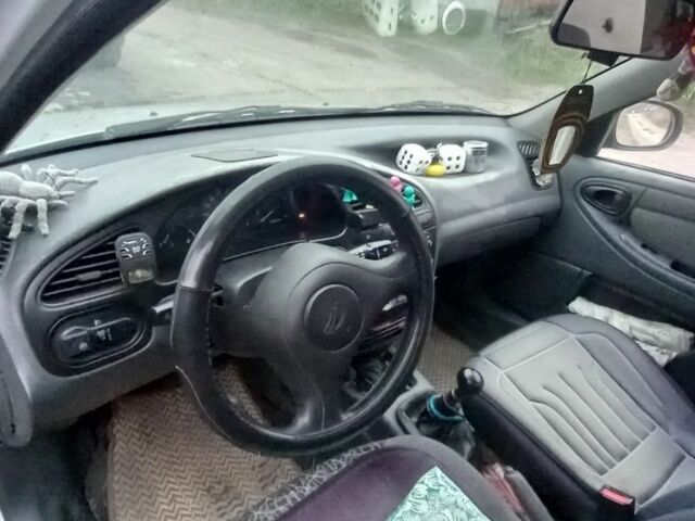 Черный Дэу Сенс, объемом двигателя 2.4 л и пробегом 210 тыс. км за 1091 $, фото 5 на Automoto.ua