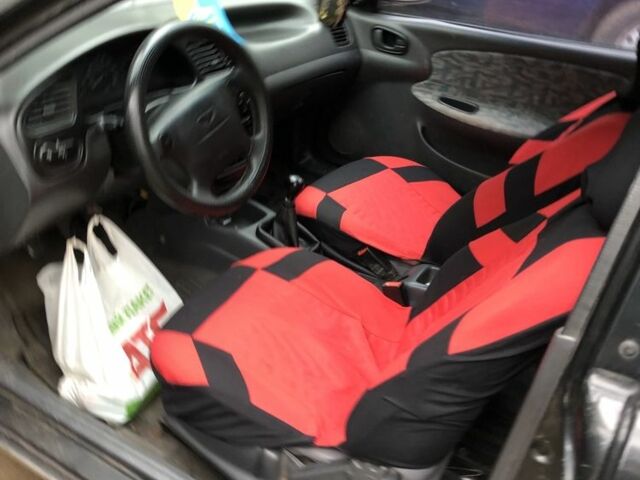 Чорний Деу Сенс, об'ємом двигуна 1.5 л та пробігом 772 тис. км за 1000 $, фото 5 на Automoto.ua