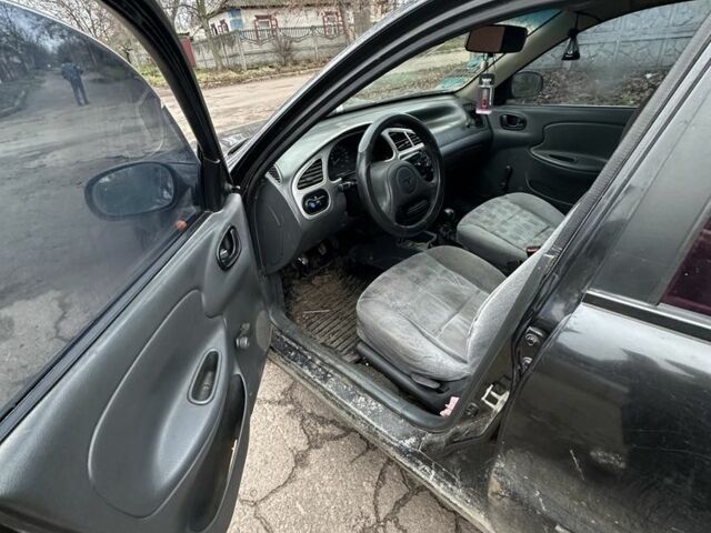 Чорний Деу Сенс, об'ємом двигуна 1.5 л та пробігом 200 тис. км за 568 $, фото 5 на Automoto.ua