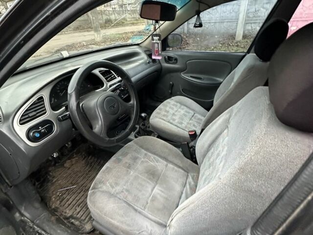 Чорний Деу Сенс, об'ємом двигуна 1.5 л та пробігом 200 тис. км за 568 $, фото 6 на Automoto.ua