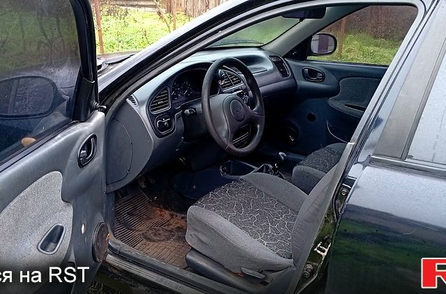 Чорний Деу Сенс, об'ємом двигуна 1.3 л та пробігом 270 тис. км за 1200 $, фото 4 на Automoto.ua