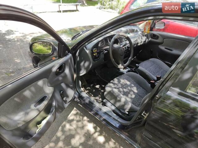 Черный Дэу Сенс, объемом двигателя 1.3 л и пробегом 174 тыс. км за 2200 $, фото 5 на Automoto.ua