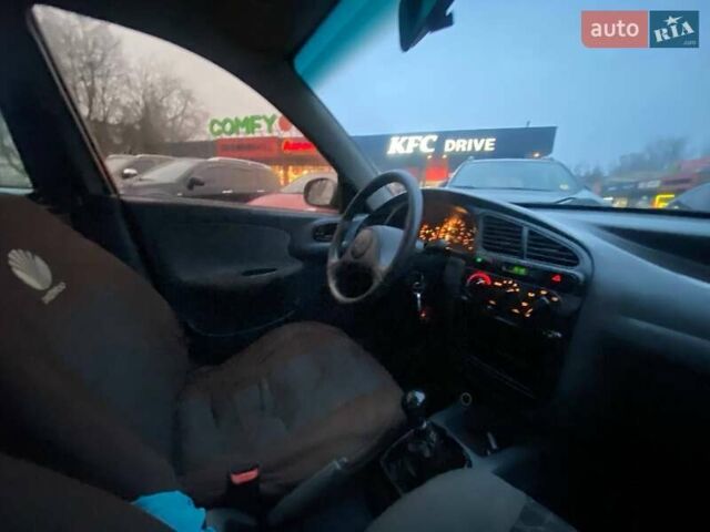 Чорний Деу Сенс, об'ємом двигуна 1.35 л та пробігом 345 тис. км за 1699 $, фото 9 на Automoto.ua