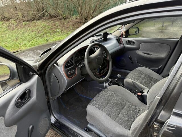 Чорний Деу Сенс, об'ємом двигуна 1.3 л та пробігом 216 тис. км за 1500 $, фото 7 на Automoto.ua