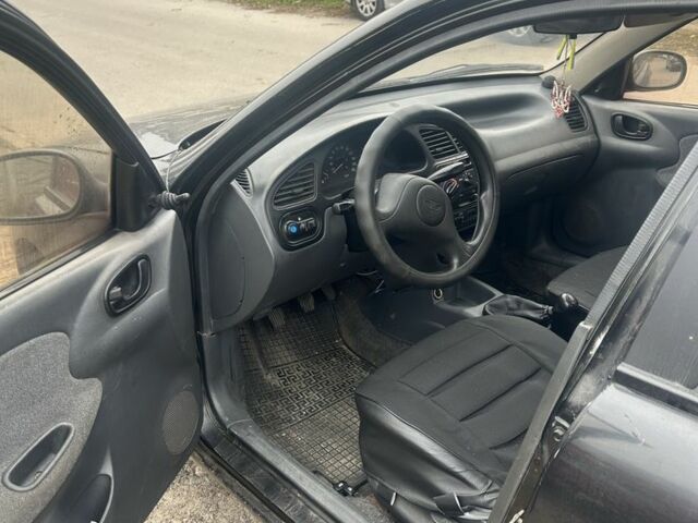 Черный Дэу Сенс, объемом двигателя 1.5 л и пробегом 225 тыс. км за 1200 $, фото 5 на Automoto.ua